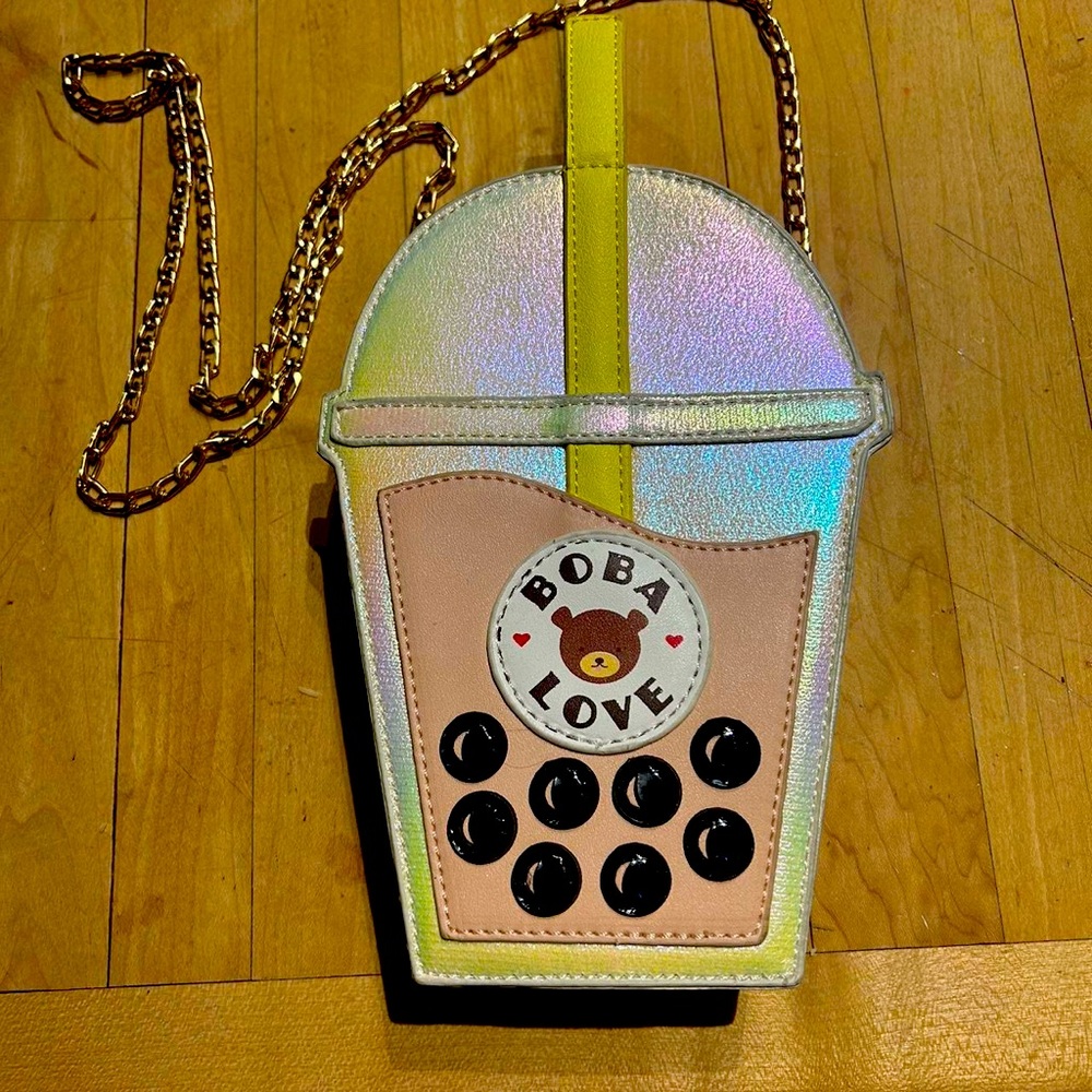 Bewaltz cross body boba tea bag. Gold accents.